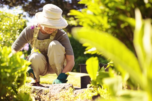 Landscape workers in Woolwich reviewing ethical compliance procedures